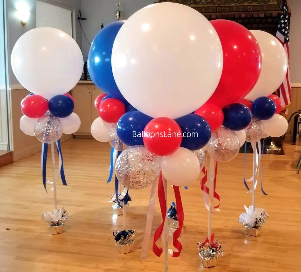 Balloon bouquet of red, white, and blue latex balloons at the entrance of the school