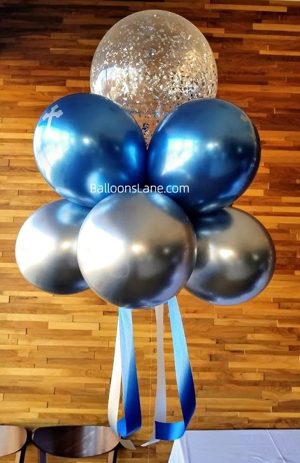 Boy christening balloon arrangement featuring silver and blue chrome balloons with silver confetti.