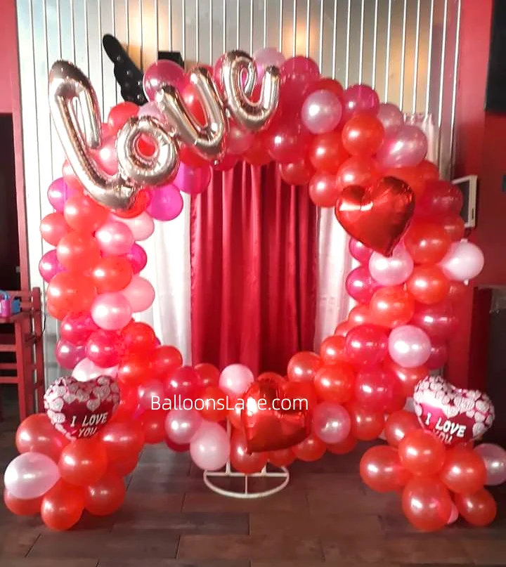 Bouquets of LOVE letter balloon, red, and pink latex balloons, and heart-shaped balloons.