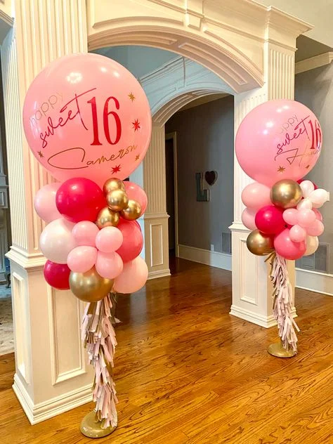 beautiful balloon column with customized sweet 16 birthday along along with gold, pink, and white in NYC