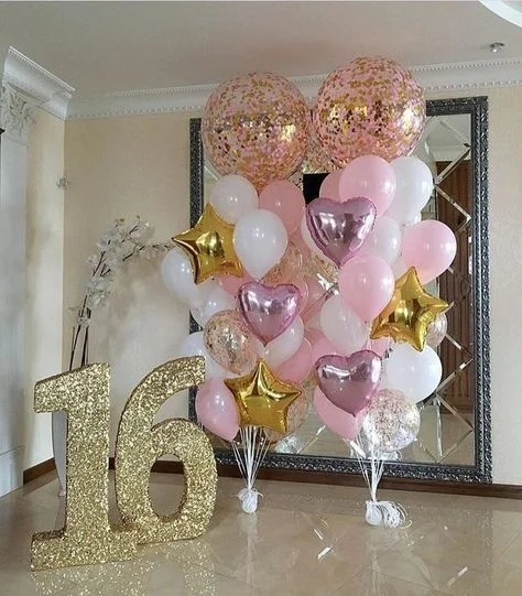 A combination of pink confetti balloon, purple heart balloon, gold star balloon, and pink, white, and gold confetti balloons to celebrate a 16th birthday or anniversary in New Jersey.