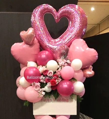 Celebrate Love on Valentine's Day with Pink Foil 3D Heart-Shaped Balloons and White & Pink Balloon Clusters in Manhattan