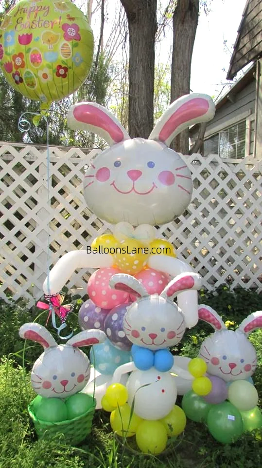 A cheerful Easter Bunny balloon bouquet featuring twisted and Mylar balloons in white and pink, complemented by latex balloons in green, white, yellow, and purple, set against a New Jersey backdrop.