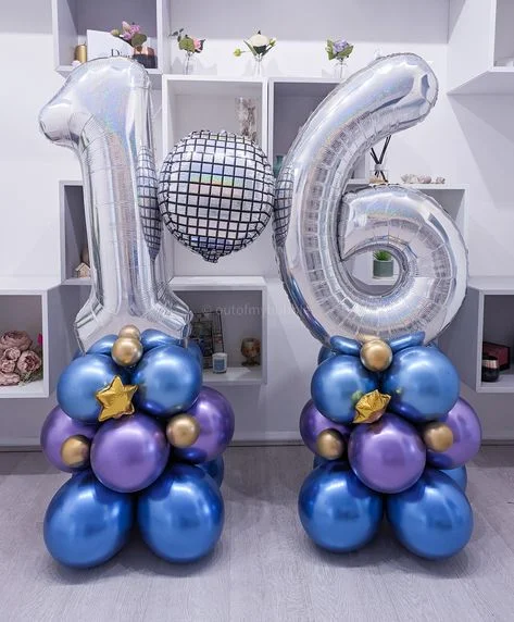A balloon cluster featuring blue, purple, and gold balloons, along with silver number balloons 1 & 6, to celebrate a 16th birthday in Manhattan