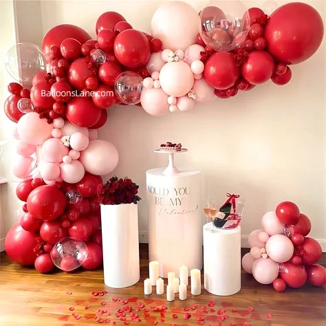 Pink, red multiple sizes balloons with clear bubble balloon garland in NYC to celebrate Valentine's Day