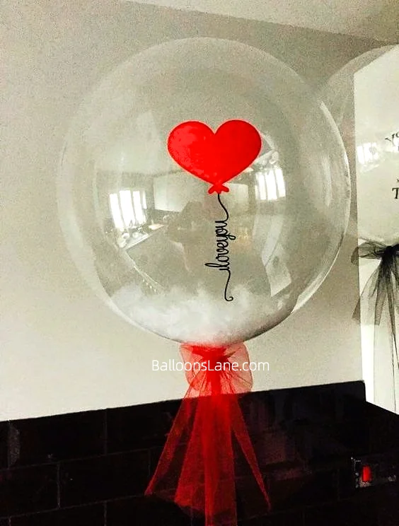 Customized Clear Feather Balloon with Bow to Celebrate Valentine's Day in Staten Island